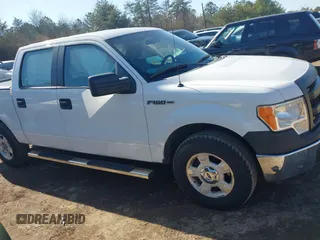 2014 Ford F-150 XL z VIN 1FTFW1CFXEFC26453, wystawiony jako IAAI lot #41490458 z przebiegiem 79 853 mil mil oraz . Historia ofert i sprzedaży dostępna na DreamBid. Obrazek 13.