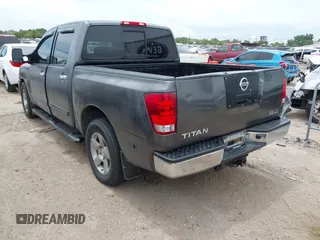2004 Nissan Titan SE with VIN 1N6AA07AX4N590102, listed as a IAAI auction lot 42575732 with 307,316 mi miles and . Bid and sale history available at DreamBid. Image 3.