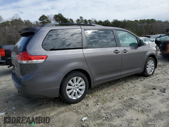 2014 Toyota Sienna LE with VIN 5TDJK3DC5ES093753, listed as a Copart auction lot 47452575 with 124,942 mi miles and Salvage Title. Bid and sale history available at DreamBid. Image 3.