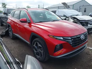 2023 Hyundai Tucson SEL z VIN 5NMJFCAE3PH220967, wystawiony jako IAAI lot #42158431 z przebiegiem 27 441 mil mil oraz . Historia ofert i sprzedaży dostępna na DreamBid. Obrazek 1.