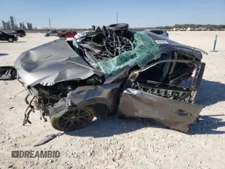 2014 Ford Focus Titanium z VIN 1FADP3N25EL264433, wystawiony jako Copart lot #48863955 z przebiegiem Nie podano mil oraz Szkoda całkowita • Salvage title. Historia ofert i sprzedaży dostępna na DreamBid. Obrazek 1.