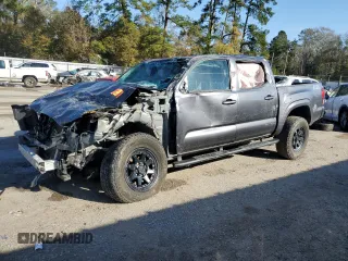 2023 Toyota Tacoma SR z VIN 3TYCZ5AN4PT148352, wystawiony jako Copart lot #86223054 z przebiegiem Nie podano mil oraz Szkoda całkowita • Salvage title. Historia ofert i sprzedaży dostępna na DreamBid. Obrazek 1.