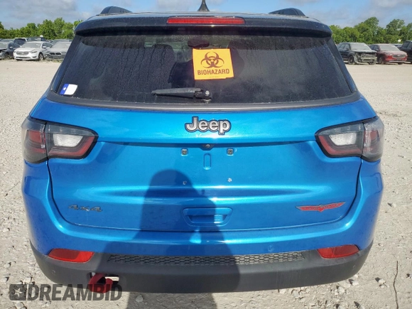 2022 Jeep Compass Trailhawk with VIN 3C4NJDDB6NT162831, listed as a Copart auction lot 66130235 with 34,762 mi miles and Salvage title. Bid and sale history available at DreamBid. Image 6.