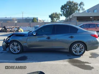 2015 Infiniti Q50 Premium with VIN JN1BV7APXFM333101, listed as a IAAI auction lot 41667109 with 112,477 mi miles and . Bid and sale history available at DreamBid. Image 15.