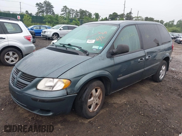 2005 Dodge Caravan SXT with VIN 1D4GP45R55B279825, listed as a IAAI auction lot 42532684 with 157,167 mi miles and . Bid and sale history available at DreamBid. Image 2.