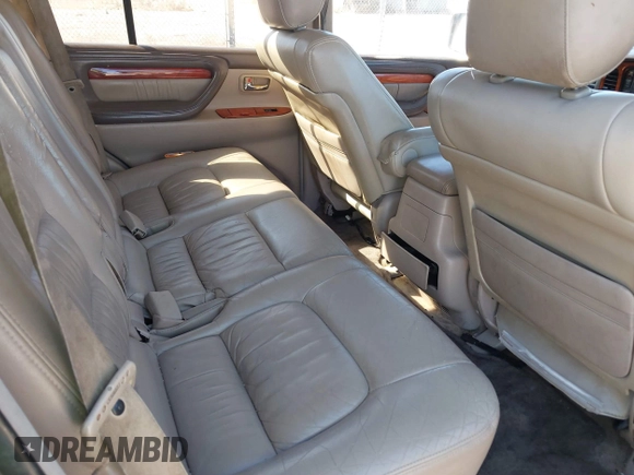 2000 Lexus LX 470 with VIN JT6HT00WXY0079873, listed as a IAAI auction lot 41605770 with 302,758 mi miles and . Bid and sale history available at DreamBid. Image 8.
