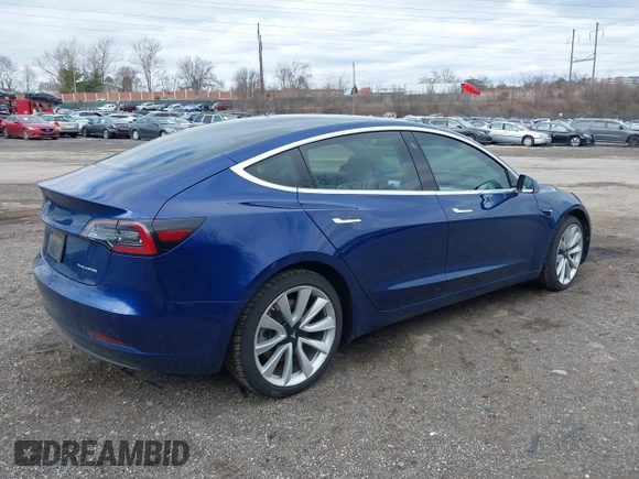 2020 Tesla Model 3 Long Range with VIN 5YJ3E1EB9LF601198, listed as a IAAI auction lot 41744287 with 70,322 mi miles and . Bid and sale history available at DreamBid. Image 4.