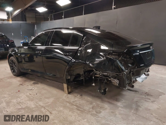 2023 Cadillac CT5 Luxury z VIN 1G6DX5RK7P0135813, wystawiony jako IAAI lot #42130722 z przebiegiem 20 738 mil mil oraz . Historia ofert i sprzedaży dostępna na DreamBid. Obrazek 3.