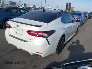 2021 Toyota Camry XSE z VIN 4T1K61AK1MU585677, wystawiony jako IAAI lot #42238920 z przebiegiem 90 089 mil mil oraz . Historia ofert i sprzedaży dostępna na DreamBid. Obrazek 4.