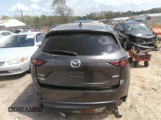 2019 Mazda CX-5 Grand Touring with VIN JM3KFBDM7K0606860, listed as a IAAI auction lot 41936338 with 93,057 mi miles. Bid and sale history available at carsss.com. Image 16.