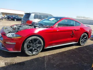 2019 Ford Mustang EcoBoost with VIN 1FA6P8TH4K5106131, listed as a IAAI auction lot 41895726 with 70,906 mi miles and . Bid and sale history available at carsss.com. Image 14.