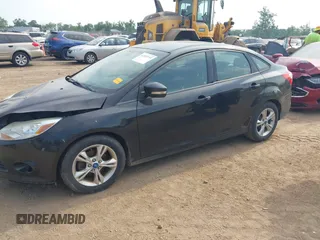 2013 Ford Focus SE with VIN 1FADP3F22DL143467, listed as a IAAI auction lot 42597755 with 241,141 mi miles and . Bid and sale history available at DreamBid. Image 2.