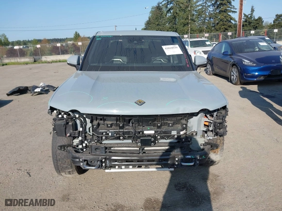2022 Rivian R1T Adventure Package with VIN 7FCTGAAA5NN007018, listed as a IAAI auction lot 42018939 with 41,991 mi miles. Bid and sale history available at carsss.com. Image 13.