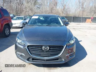 2017 Mazda 3 Grand Touring z VIN 3MZBN1W39HM137879, wystawiony jako IAAI lot #41857308 z przebiegiem 73 569 mil mil oraz . Historia ofert i sprzedaży dostępna na DreamBid. Obrazek 6.
