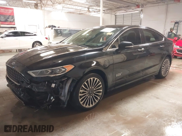 2017 Ford Fusion Titanium with VIN 3FA6P0SUXHR208653, listed as a IAAI auction lot 41312067 with 62,601 mi miles and . Bid and sale history available at DreamBid. Image 17.