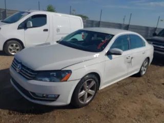 2012 Volkswagen Passat SE with VIN 1VWBH7A32CC091887, listed as a IAAI auction lot 41996295 with 163,011 mi miles. Bid and sale history available at carsss.com. Image 2.