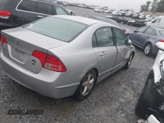 2006 Honda Civic LX with VIN 2HGFA16556H520894, listed as a IAAI auction lot 41963736 with 166,682 mi miles and . Bid and sale history available at DreamBid. Image 4.