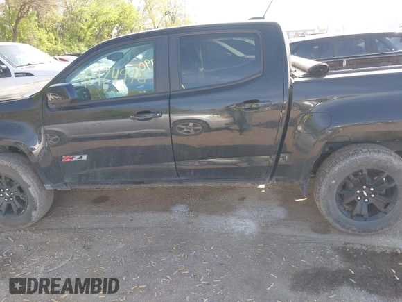 2021 Chevrolet Colorado 4WD Z71 with VIN 1GCGTDEN5M1167486, listed as a IAAI auction lot 42124990 with 162,297 mi miles and . Bid and sale history available at DreamBid. Image 14.