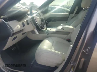 2025 Land Rover Range Rover SE with VIN SALKPBFU6SA291703, listed as a Copart auction lot 63094105 with 2,577 mi miles and Salvage title. Bid and sale history available at DreamBid. Image 7.