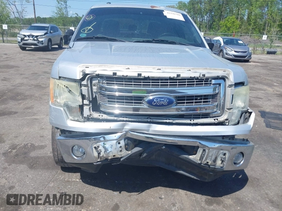 2013 Ford F-150 XL z VIN 1FTFW1CF4DFD63872, wystawiony jako IAAI lot #41948708 z przebiegiem 197 434 mil mil oraz . Historia ofert i sprzedaży dostępna na DreamBid. Obrazek 6.