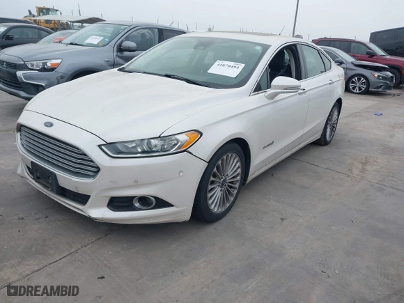 2014 Ford Fusion Titanium Hybrid with VIN 3FA6P0RU6ER115985, listed as a IAAI auction lot 41870494 with 132,321 mi miles. Bid and sale history available at carsss.com. Image 2.