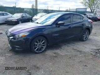 2018 Mazda 3 Touring with VIN 3MZBN1V35JM201844, listed as a IAAI auction lot 42051674 with 75,932 mi miles and . Bid and sale history available at DreamBid. Image 16.