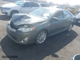 2014 Toyota Camry Hybrid LE with VIN 4T1BD1FK6EU129691, listed as a IAAI auction lot 41796112 with 264,392 mi miles. Bid and sale history available at carsss.com. Image 2.