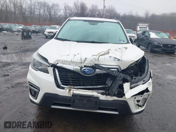 2019 Subaru Forester Touring with VIN JF2SKAWC3KH555900, listed as a IAAI auction lot 41558281 with 138,351 mi miles. Bid and sale history available at carsss.com. Image 12.