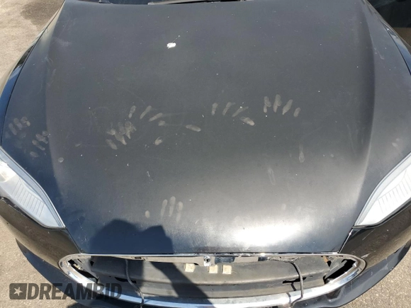 2013 Tesla Model S z VIN 5YJSA1CN8DFP22679, wystawiony jako Copart lot #64195095 z przebiegiem Nie podano mil oraz Czysty tytuł • Clean title. Historia ofert i sprzedaży dostępna na DreamBid. Obrazek 11.