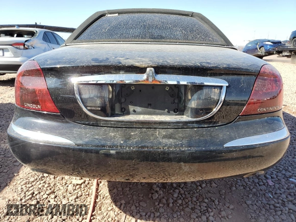 2001 Lincoln Continental with VIN 1LNHM97V61Y604213, listed as a Copart auction lot 52517535 with 112,391 mi miles and Salvage Title. Bid and sale history available at DreamBid. Image 6.