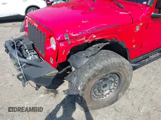 2016 Jeep Wrangler Unlimited Rubicon with VIN 1C4HJWFG7GL128994, listed as a IAAI auction lot 40503403 with 85,950 mi miles. Bid and sale history available at carsss.com. Image 6.