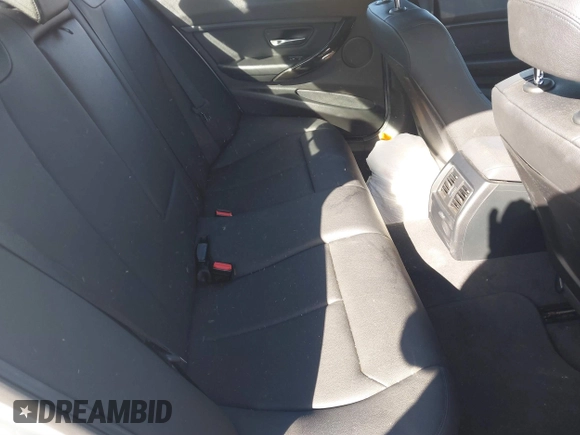 2016 BMW 3 Series 320i xDrive with VIN WBA8E5G51GNU21867, listed as a IAAI auction lot 40593300 with 99,044 mi miles and . Bid and sale history available at DreamBid. Image 8.