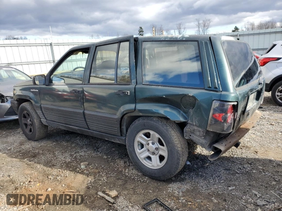 1993 Jeep Grand Cherokee Laredo with VIN 1J4GZ58S4PC580315, listed as a Copart auction lot 85105304 with 202,460 mi miles and Clean Title. Bid and sale history available at carsss.com. Image 2.
