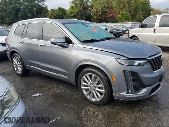 2021 Cadillac XT6 Premium Luxury z VIN 1GYKPDRS6MZ216642, wystawiony jako Copart lot #70779163 z przebiegiem 23 033 mil mil oraz . Historia ofert i sprzedaży dostępna na DreamBid. Obrazek 4.