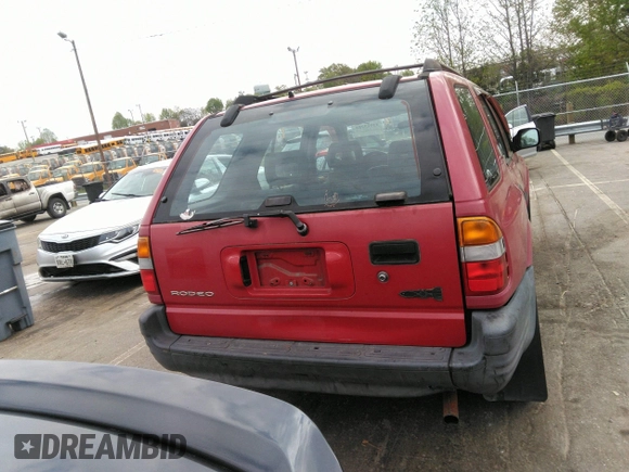 1998 Isuzu Rodeo S z VIN 4S2CK58WXW4325645, wystawiony jako IAAI lot #42013228 z przebiegiem 300 698 mil mil oraz . Historia ofert i sprzedaży dostępna na DreamBid. Obrazek 16.