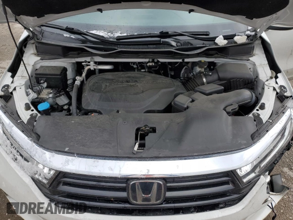 2022 Honda Odyssey Touring z VIN 5FNRL6H89NB039089, wystawiony jako Copart lot #81227004 z przebiegiem 50 881 mil mil oraz Szkoda całkowita • Salvage title. Historia ofert i sprzedaży dostępna na DreamBid. Obrazek 13.