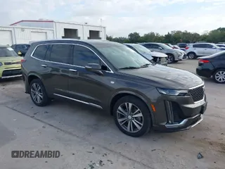 2020 Cadillac XT6 AWD Premium Luxury with VIN 1GYKPDRS2LZ205541, listed as a IAAI auction lot 41224342 with 53,947 mi miles. Bid and sale history available at carsss.com. Image 1.