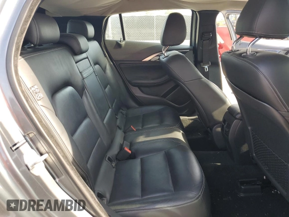 2018 Infiniti QX30 Luxury with VIN SJKCH5CP2JA057398, listed as a Copart auction lot 54543755 with 99,058 mi miles and Clean title. Bid and sale history available at DreamBid. Image 11.