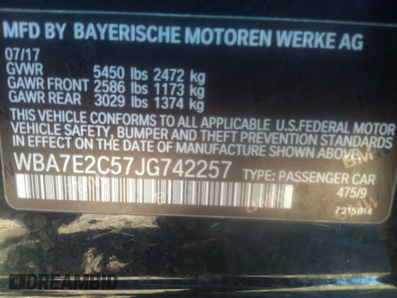 2018 BMW 7 Series 740i with VIN WBA7E2C57JG742257, listed as a IAAI auction lot 41353435 with 77,125 mi miles. Bid and sale history available at carsss.com. Image 9.