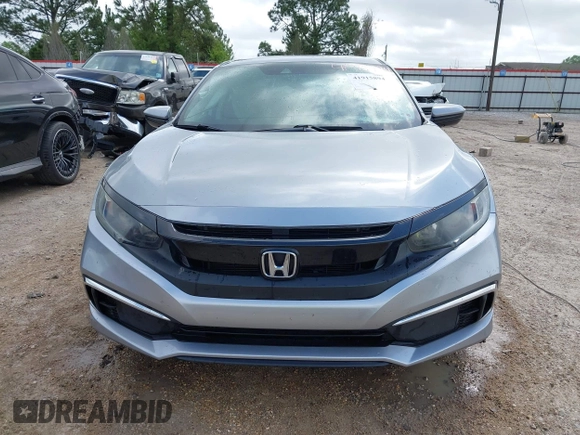 2019 Honda Civic LX with VIN 19XFC2F60KE043806, listed as a IAAI auction lot 41915894 with 123,141 mi miles and . Bid and sale history available at DreamBid. Image 13.
