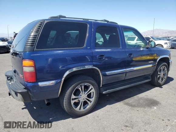 2001 GMC Yukon SLT z VIN 1GKEK13T41J138068, wystawiony jako Copart lot #52823455 z przebiegiem 163 319 mil mil oraz Szkoda całkowita • Salvage title. Historia ofert i sprzedaży dostępna na DreamBid. Obrazek 3.