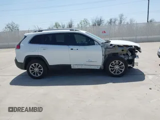 2019 Jeep Cherokee Latitude Plus with VIN 1C4PJLLB5KD301109, listed as a IAAI auction lot 41858478 with 52,647 mi miles and . Bid and sale history available at DreamBid. Image 13.
