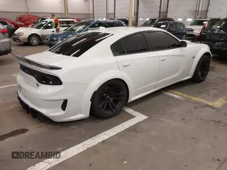 2021 Dodge Charger Scat Pack with VIN 2C3CDXGJ6MH563553, listed as a IAAI auction lot 41745898 with 39,844 mi miles and . Bid and sale history available at DreamBid. Image 4.