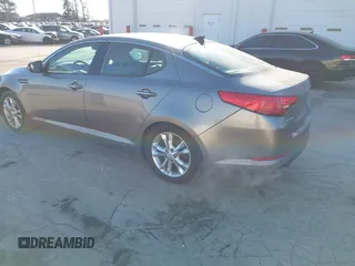 2013 Kia Optima EX with VIN 5XXGN4A74DG223147, listed as a IAAI auction lot 41371719 with 135,331 mi miles and . Bid and sale history available at carsss.com. Image 3.