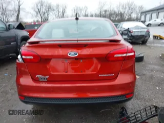 2018 Ford Focus Titanium with VIN 1FADP3J20JL280698, listed as a IAAI auction lot 41823530 with 54,841 mi miles and . Bid and sale history available at DreamBid. Image 16.