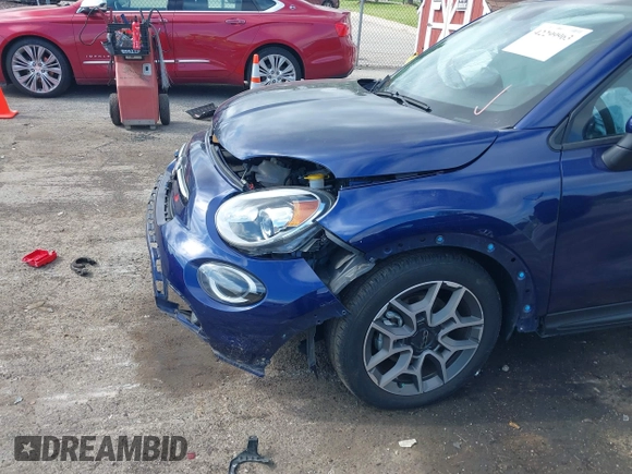 2021 FIAT 500X Trekking with VIN ZFBNF3B10MP945509, listed as a IAAI auction lot 42299963 with 35,474 mi miles and . Bid and sale history available at DreamBid. Image 6.