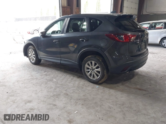 2015 Mazda CX-5 Touring with VIN JM3KE4CY6F0510002, listed as a IAAI auction lot 42045284 with 88,949 mi miles and . Bid and sale history available at DreamBid. Image 3.