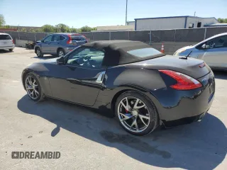 2014 Nissan 370Z Touring with VIN JN1AZ4FH6EM620580, listed as a Copart auction lot 49808725 with 80,591 mi miles and Clean Title. Bid and sale history available at DreamBid. Image 2.