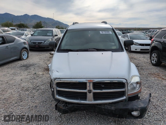 2005 Dodge Durango SLT with VIN 1D4HB48D95F529241, listed as a Copart auction lot 58195995 with 243,097 mi miles and Salvage title. Bid and sale history available at DreamBid. Image 5.