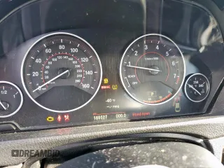 2015 BMW 4 Series 428i z VIN WBA3N3C55FK231929, wystawiony jako Copart lot #57683365 z przebiegiem 169 527 mil mil oraz Szkoda całkowita • Salvage title. Historia ofert i sprzedaży dostępna na DreamBid. Obrazek 9.